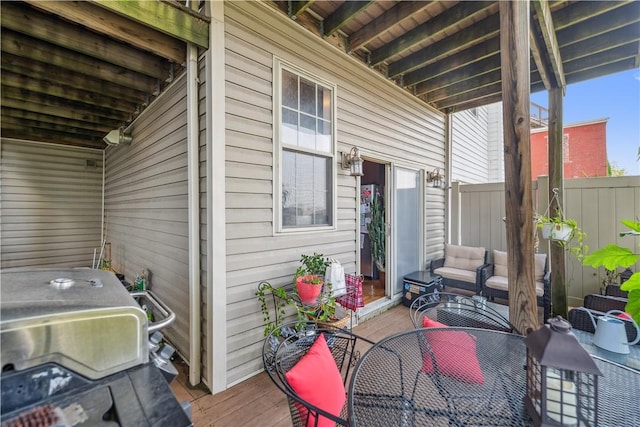 view of patio with fence and grilling area