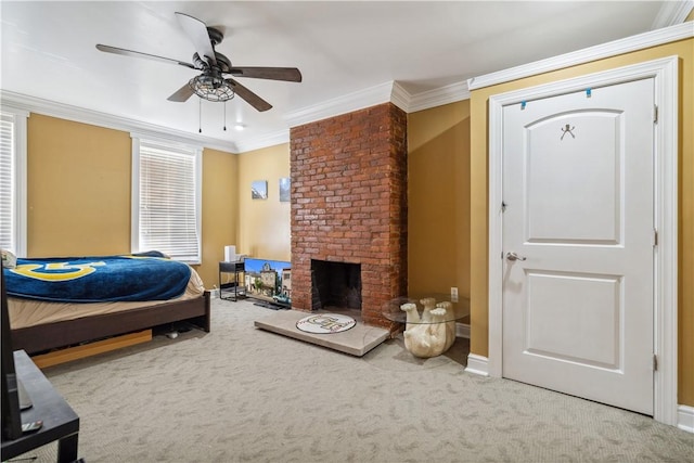 bedroom with carpet flooring, crown molding, and a fireplace