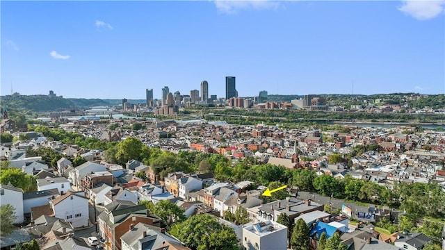 drone / aerial view with a view of city