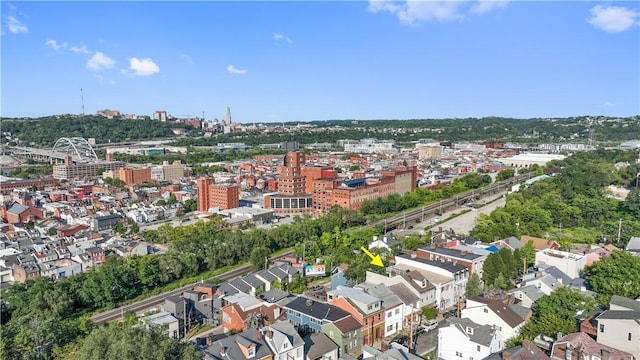 birds eye view of property with a view of city