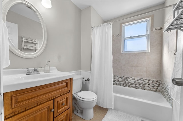 full bathroom with vanity, toilet, shower / bath combination with curtain, and tile patterned flooring