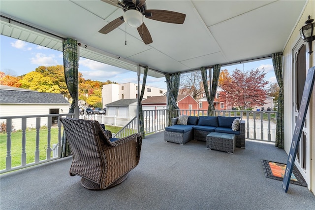 view of patio featuring an outdoor living space and ceiling fan