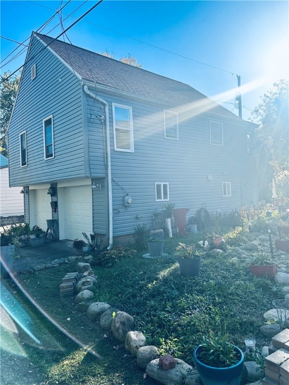 view of home's exterior with a garage