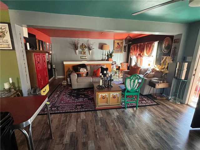 living room featuring dark hardwood / wood-style flooring and plenty of natural light