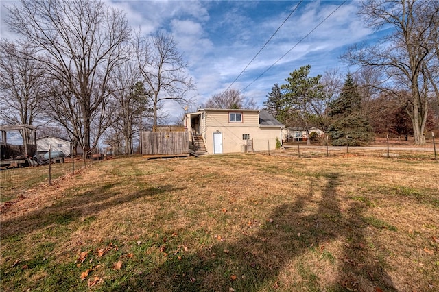 view of yard with a wooden deck