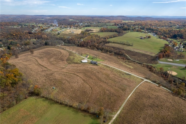 birds eye view of property featuring a rural view