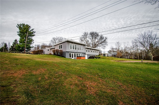 view of property exterior with a yard