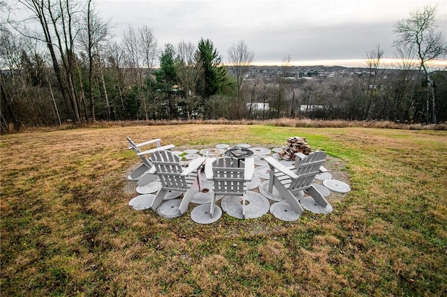 132 Random Rd, Corry, PA 16407 - view of grassy yard with a fire pit