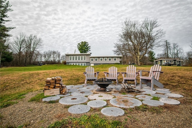 view of patio / terrace featuring a fire pit