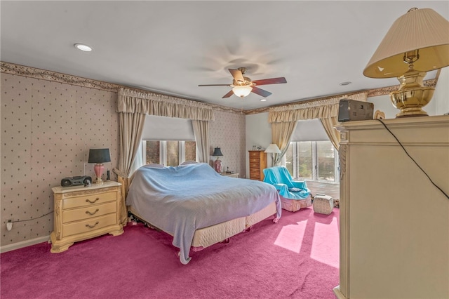 bedroom with ceiling fan and carpet floors