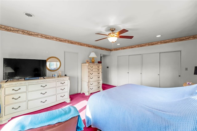 bedroom with carpet flooring, a closet, and ceiling fan