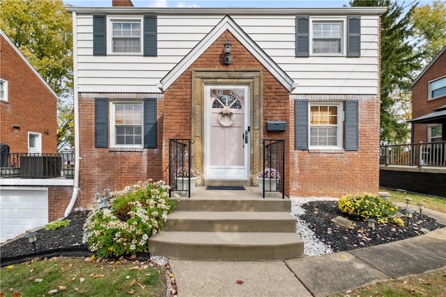 view of front of home with a garage