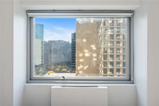 320 Fort Duquesne Blvd Unit 11-O, Downtown Pgh, PA 15222 - detailed view of radiator heating unit and a view of city