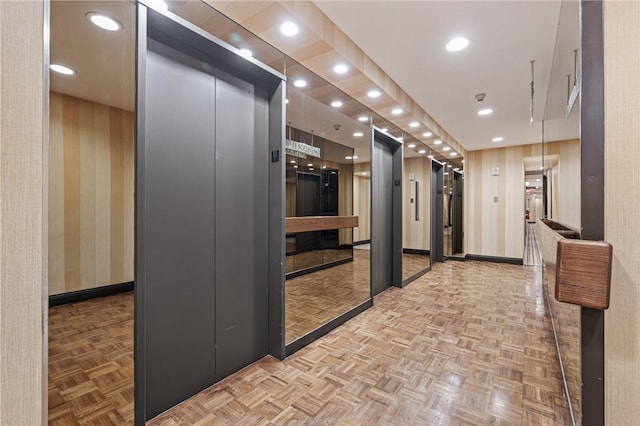 320 Fort Duquesne Blvd Unit 11-O, Downtown Pgh, PA 15222 - kitchen featuring baseboards, wallpapered walls, elevator, and recessed lighting