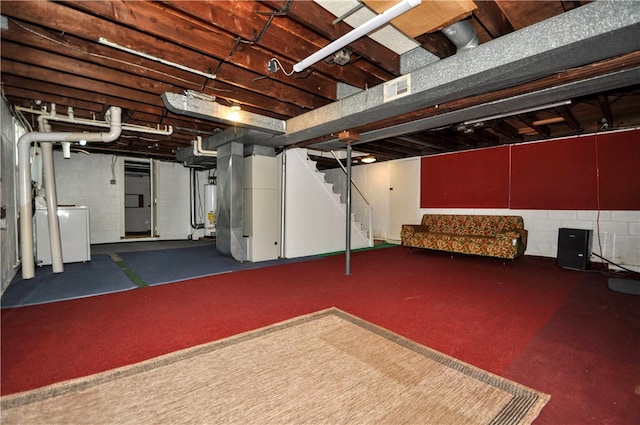 basement with washer / dryer and gas water heater