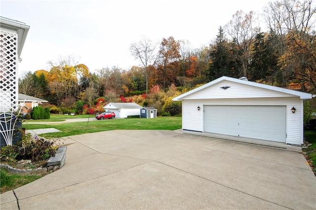 garage featuring a yard