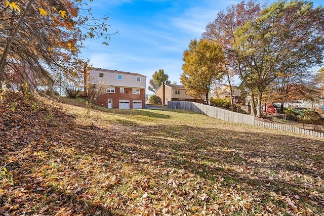 view of yard with a garage