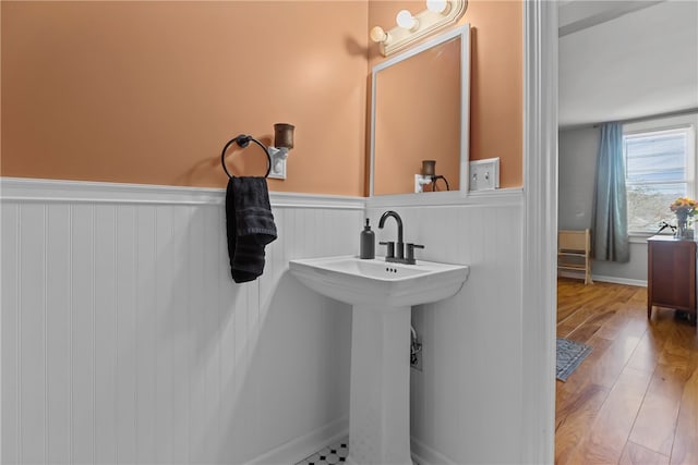 bathroom with hardwood / wood-style flooring