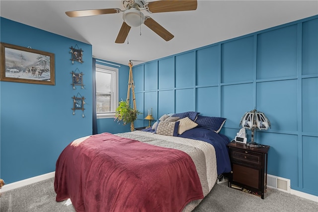 bedroom featuring ceiling fan and carpet flooring