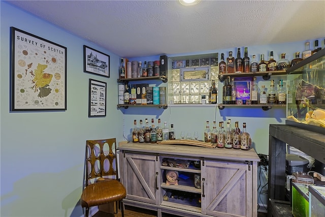 bar with a textured ceiling