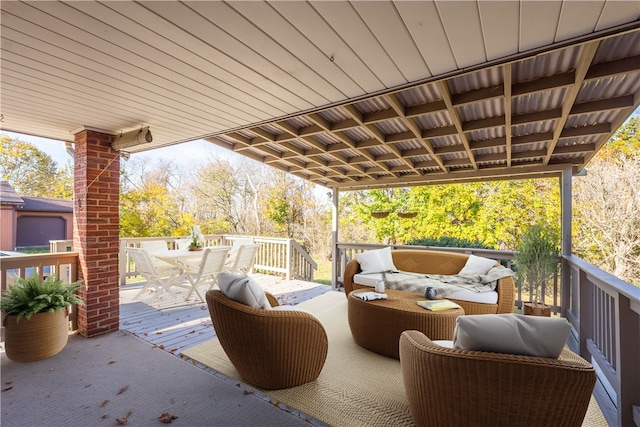 view of patio featuring an outdoor living space and a deck