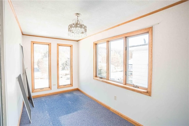 79-81 Lower Clinton St, Canoe/Banks Twps, PA 15772 - carpeted spare room with ornamental molding, baseboards, and a chandelier