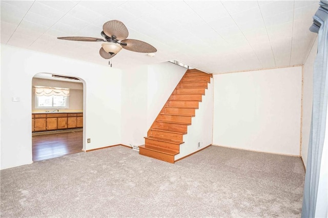 79-81 Lower Clinton St, Canoe/Banks Twps, PA 15772 - below grade area featuring carpet flooring, arched walkways, stairway, ceiling fan, and a sink