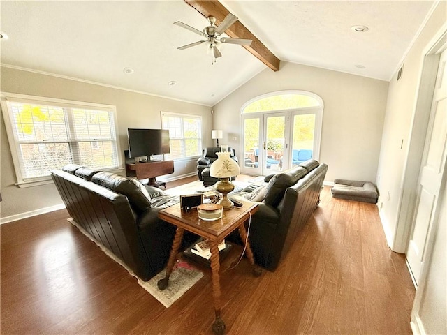 living room featuring french doors, ceiling fan, hardwood / wood-style floors, and vaulted ceiling with beams