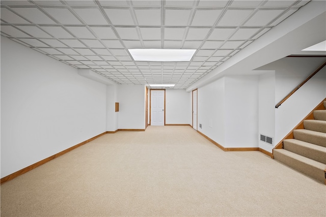 basement with light carpet