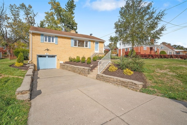 view of front facade with a front lawn and a garage