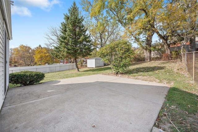 view of patio featuring a storage shed