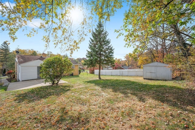 view of yard featuring a patio area and a storage unit