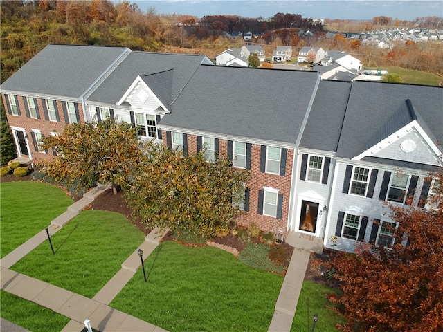 exterior space with a front yard