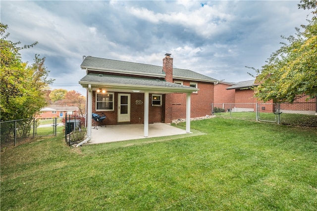 rear view of property featuring a patio area, central AC unit, and a lawn