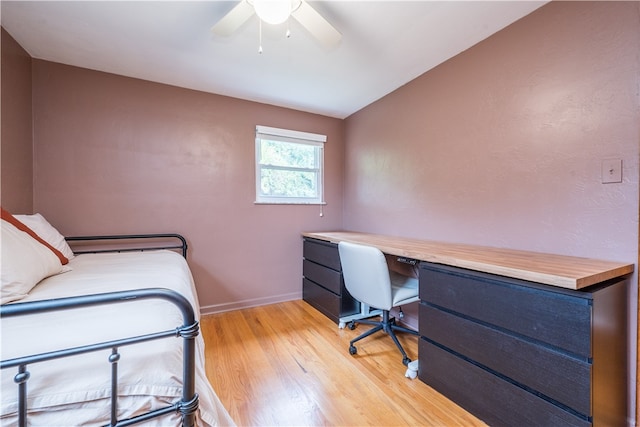 bedroom featuring light hardwood / wood-style flooring and ceiling fan