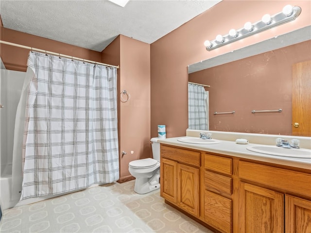 full bathroom with vanity, toilet, a textured ceiling, and shower / bath combination with curtain