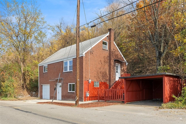 view of property exterior with a garage