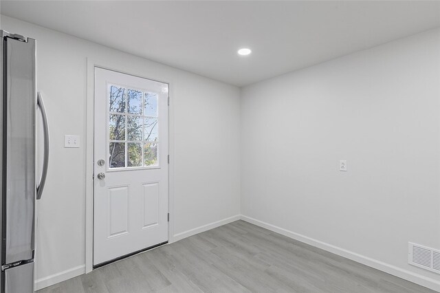 entryway with light wood-type flooring