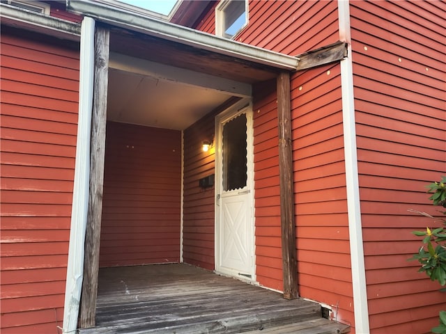 entrance to property with a deck