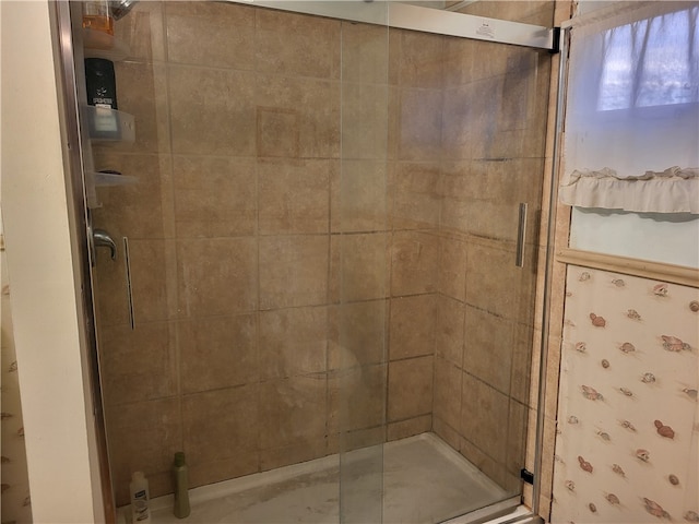 bathroom featuring walk in shower