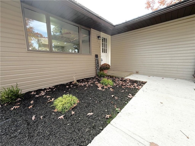 doorway to property featuring a patio