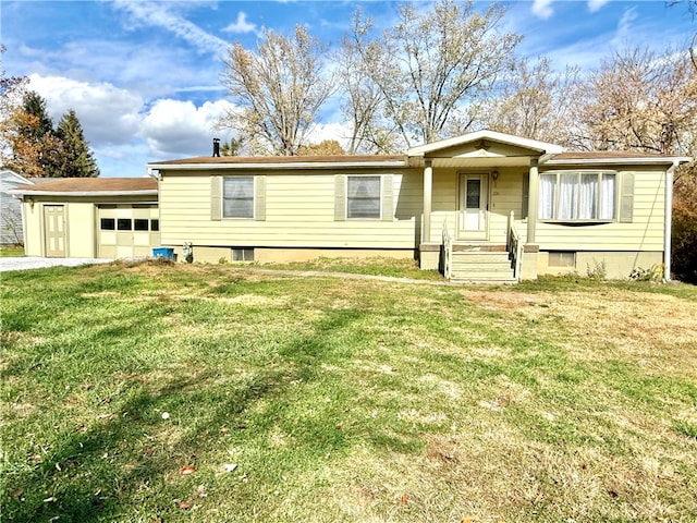 view of front facade featuring a front yard and a garage