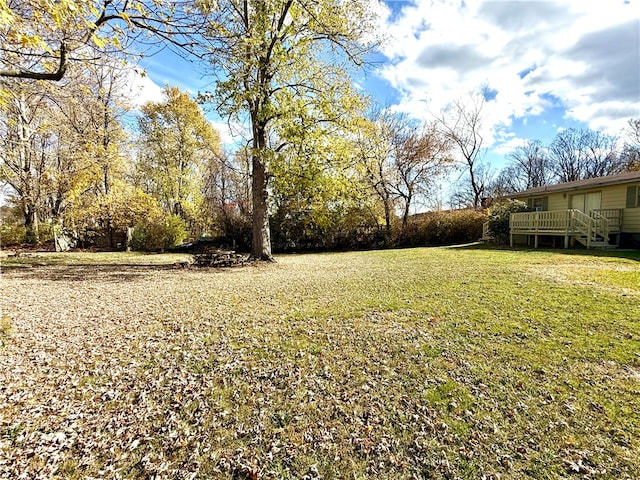 view of yard with a deck