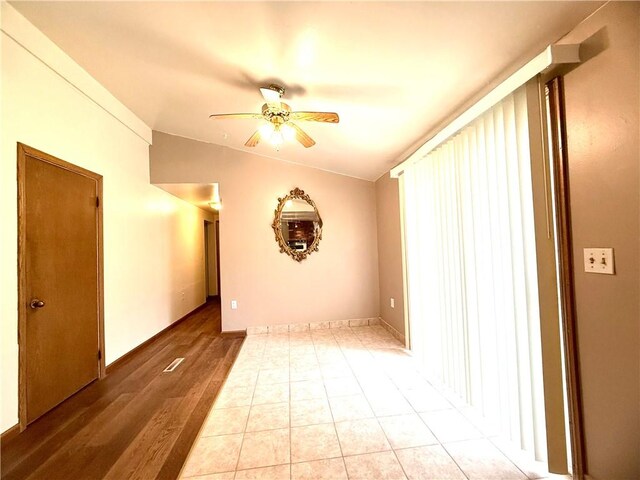 226 Cottage Ave, Masontown, PA 15461 - spare room featuring ceiling fan, light wood finished floors, and baseboards