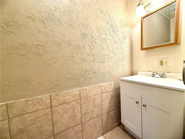 226 Cottage Ave, Masontown, PA 15461 - bathroom featuring vanity and a textured wall