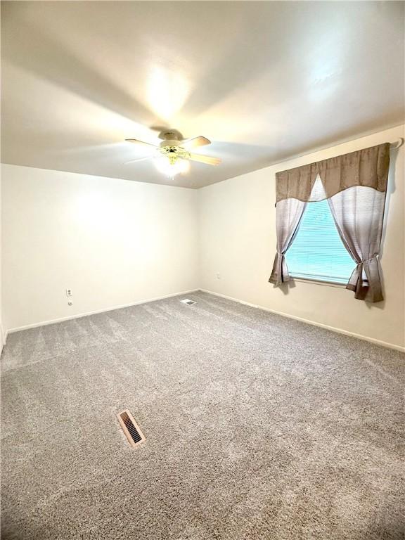 226 Cottage Ave, Masontown, PA 15461 - empty room with a ceiling fan, carpet, and baseboards