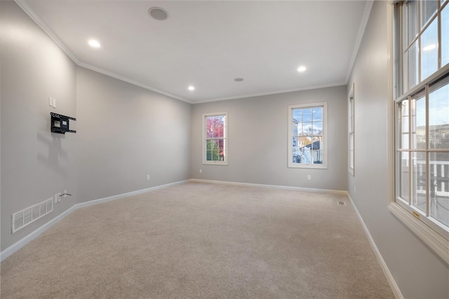 carpeted spare room with ornamental molding