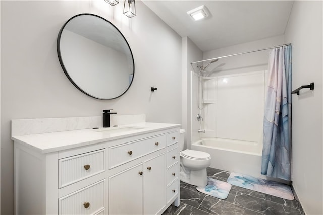 full bathroom with vanity, shower / bath combination with curtain, and toilet