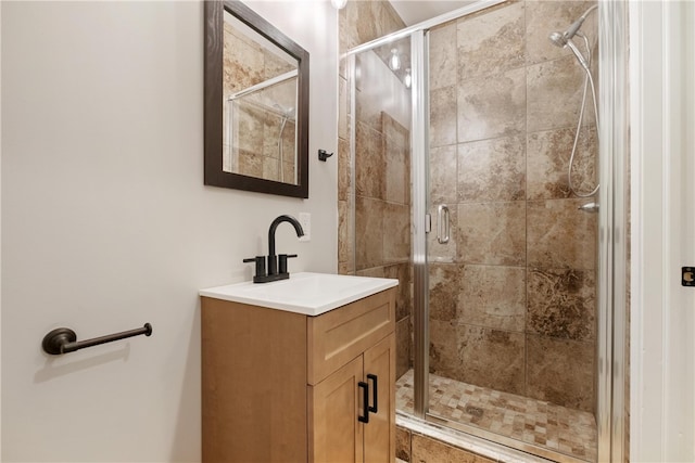 bathroom with vanity and walk in shower