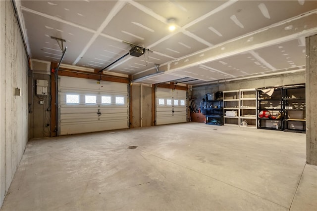 garage featuring a garage door opener